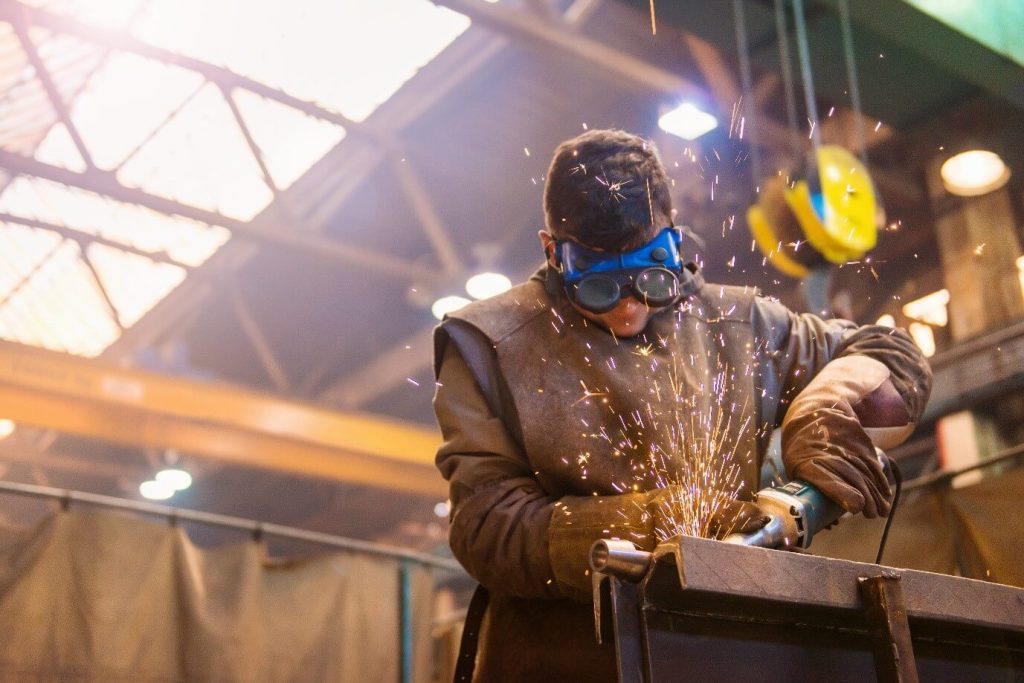 Professional working with the Boilermaker and welding machine